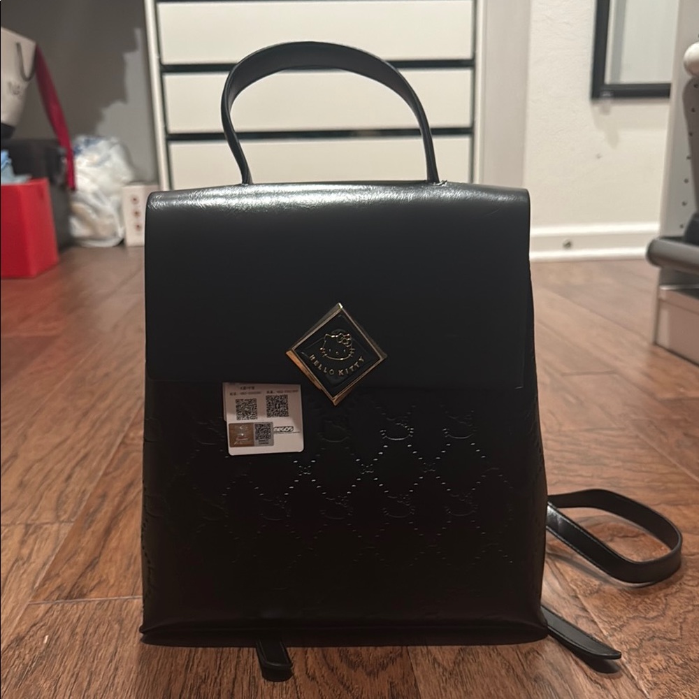 Aldo Black Backpack with Sleek Design and Minimalist Style